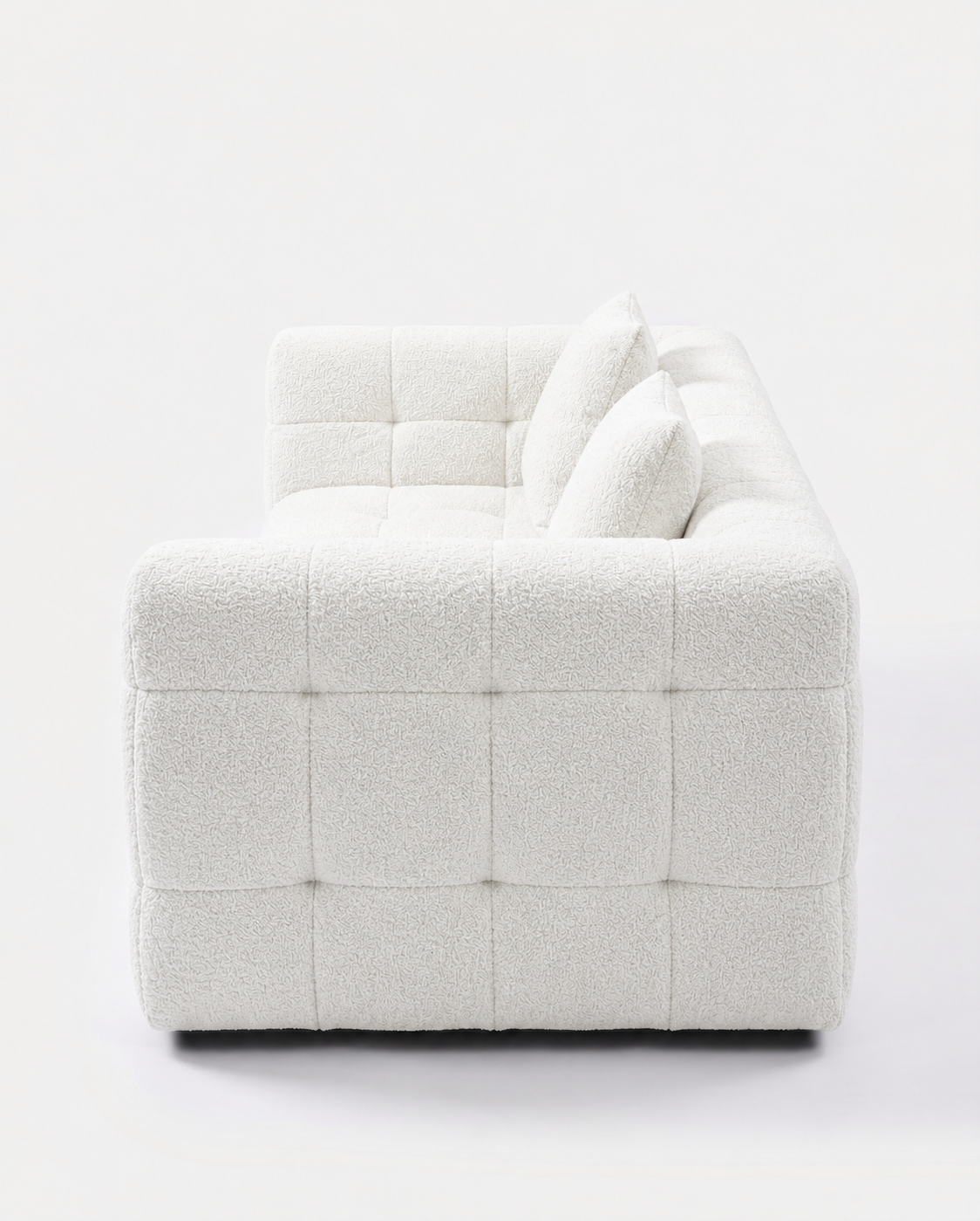 Marshmallow Cloud Lounge Sofa side view with white grid-tufted upholstery