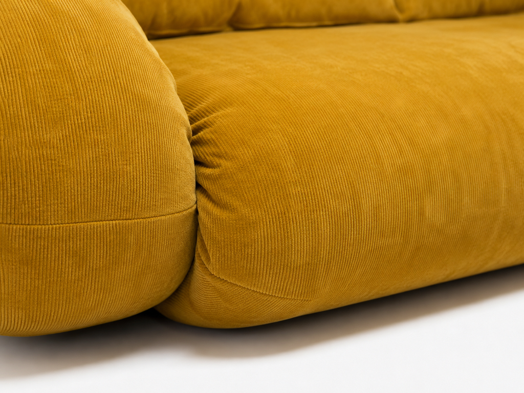 Tovo Plush Pillow Sleeper Sofa in Yellow with plush corduroy cushion detail