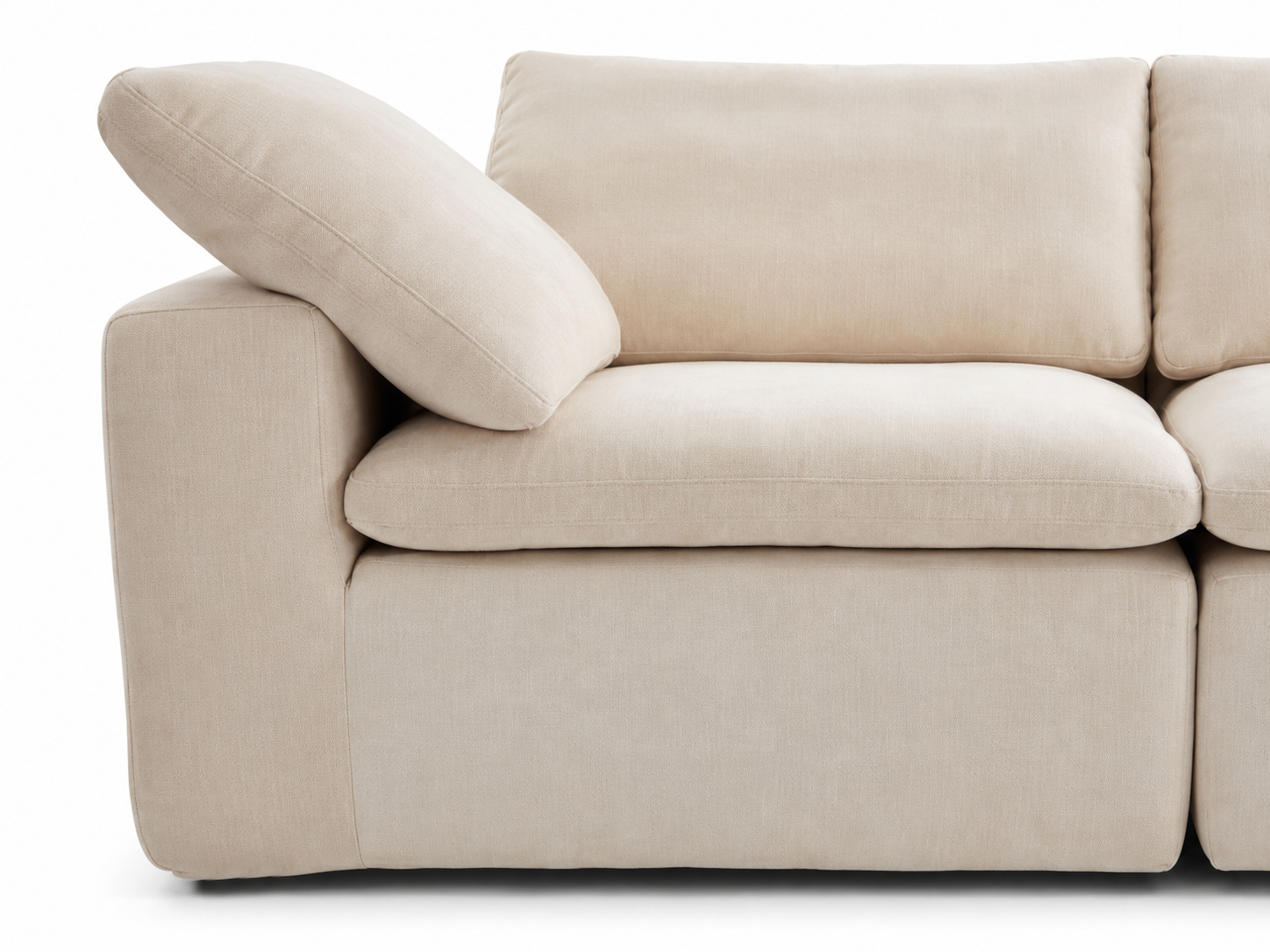 Aero’s wide armrests and loose pillows create a relaxed, sink-in feel for everyday lounging.
