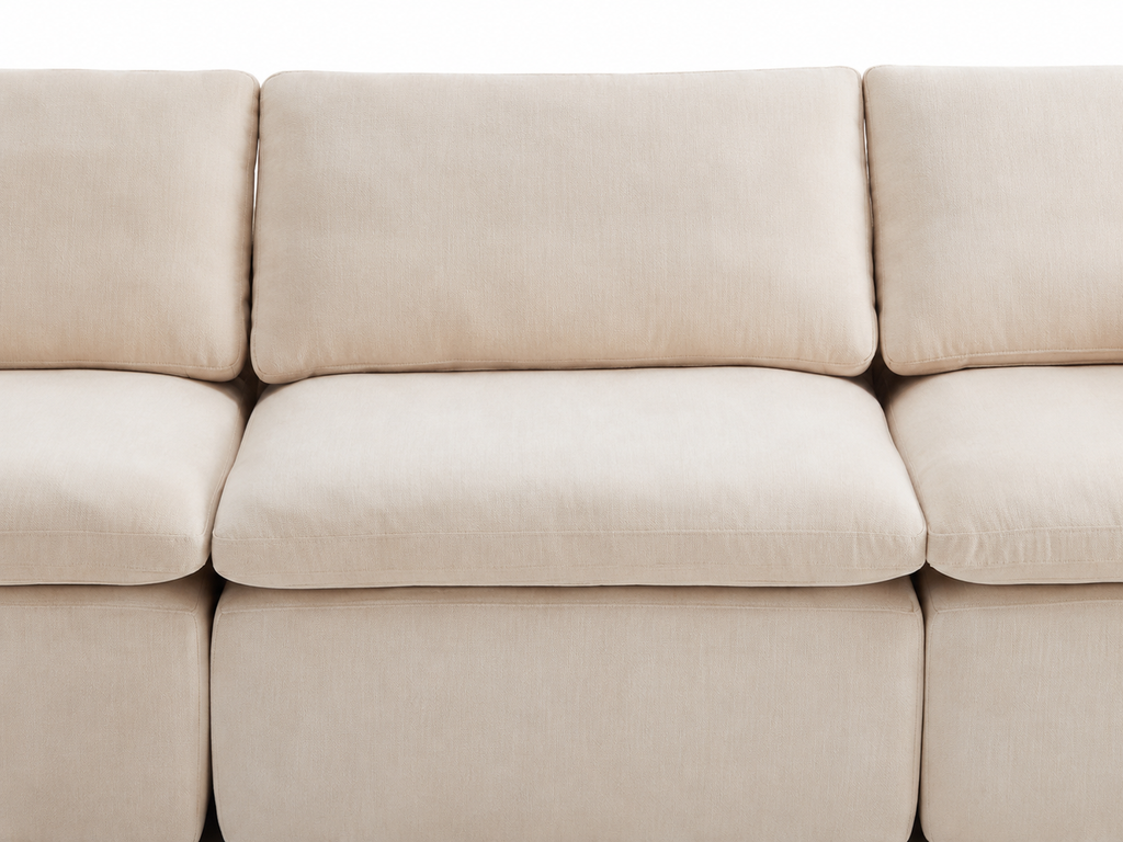 Front detail of Aero modular sectional sofa with soft back cushions and wide seat design