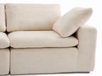 Aero modular sofa close-up showing wide armrest, pillow, and textured linen-cotton fabric