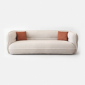 Lune Bouclé Crescent Sofa in cream white with soft curved silhouette