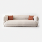 Lune Bouclé Crescent Sofa in cream white with soft curved silhouette