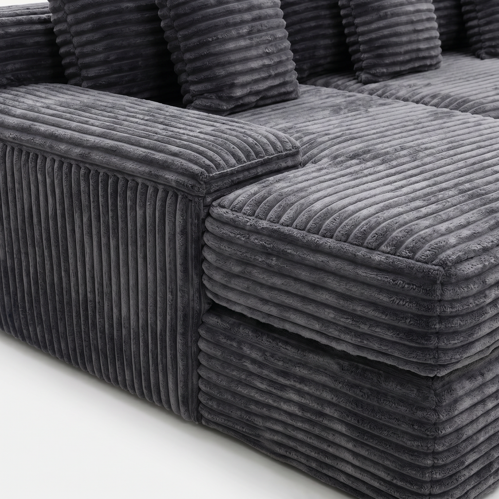 Close-up of charcoal plush corduroy fabric on Rumi sectional sofa