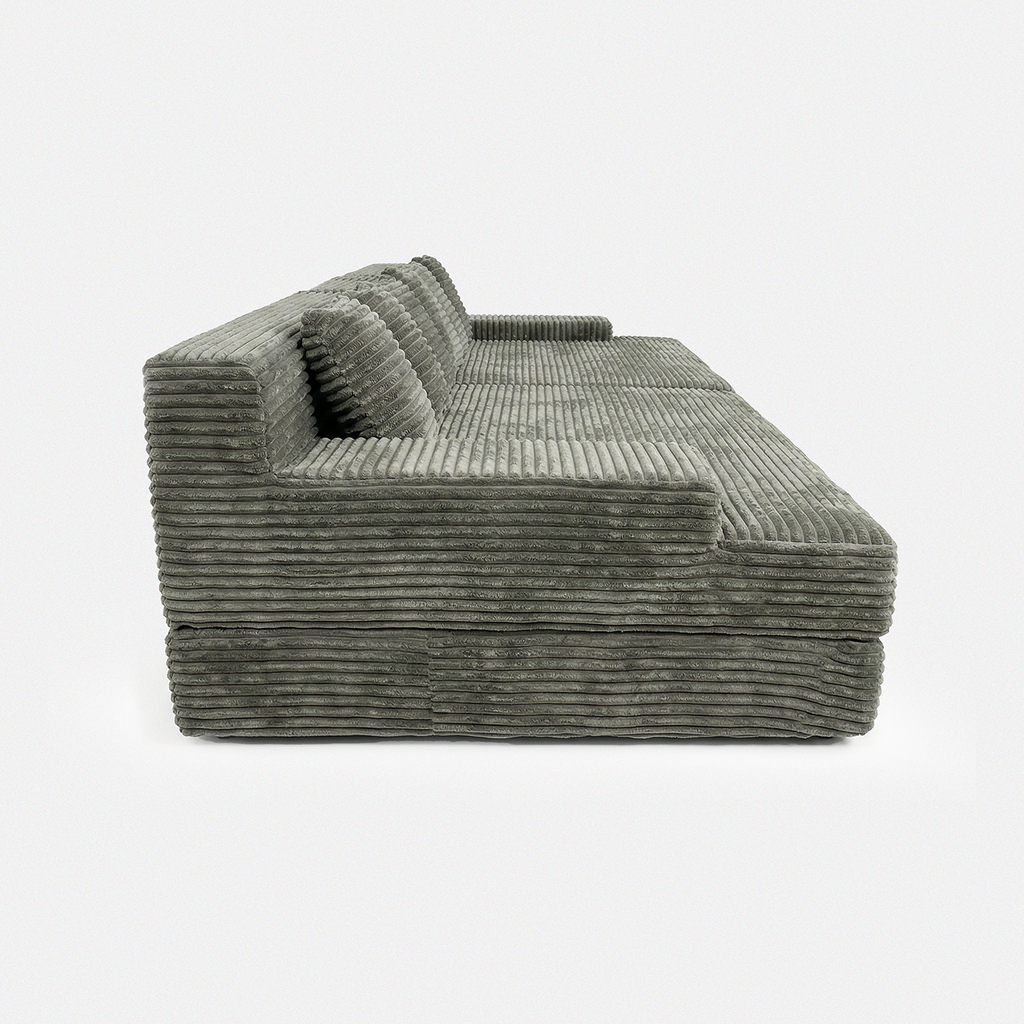 Side view of Lune Corduroy Horizon Sectional Sofa with wide arms and deep lounge seat