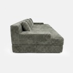 Side view of Lune Corduroy Horizon Sectional Sofa with wide arms and deep lounge seat