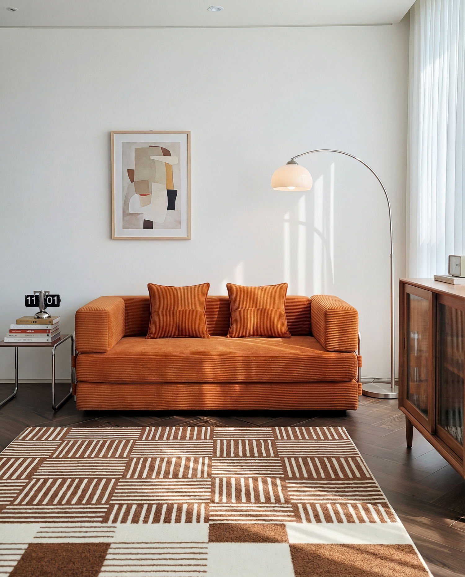 Milo Corduroy Sleeper Sofa in Tangerine styled in a bright modern living room