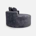 Noma Charcoal Deep Lounge Chair side view with oversized round lounge shape
