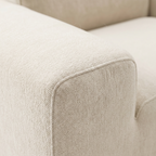 Tovo Cream Wide Accent Chair armrest detail with plush fabric texture