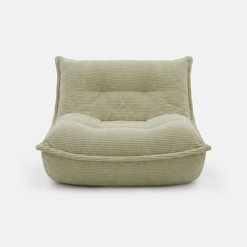 Lune Cream Lounge Chair in Moss with curved lounge design and plush corduroy texture