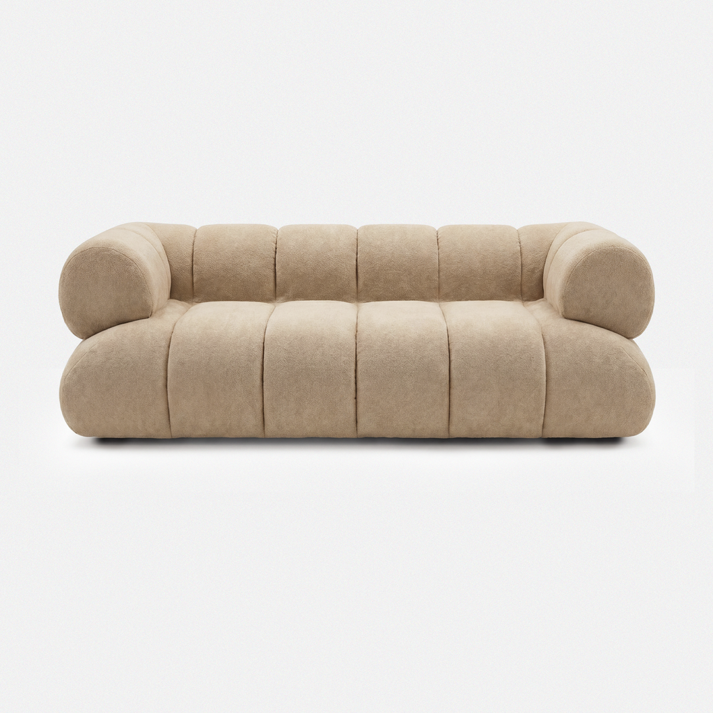 Aven Sculptural Offset Sofa in khaki beige with soft sherpa-style upholstery