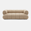 Aven Sculptural Offset Sofa in khaki beige with soft sherpa-style upholstery