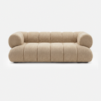 Aven Sculptural Offset Sofa in khaki beige with soft sherpa-style upholstery