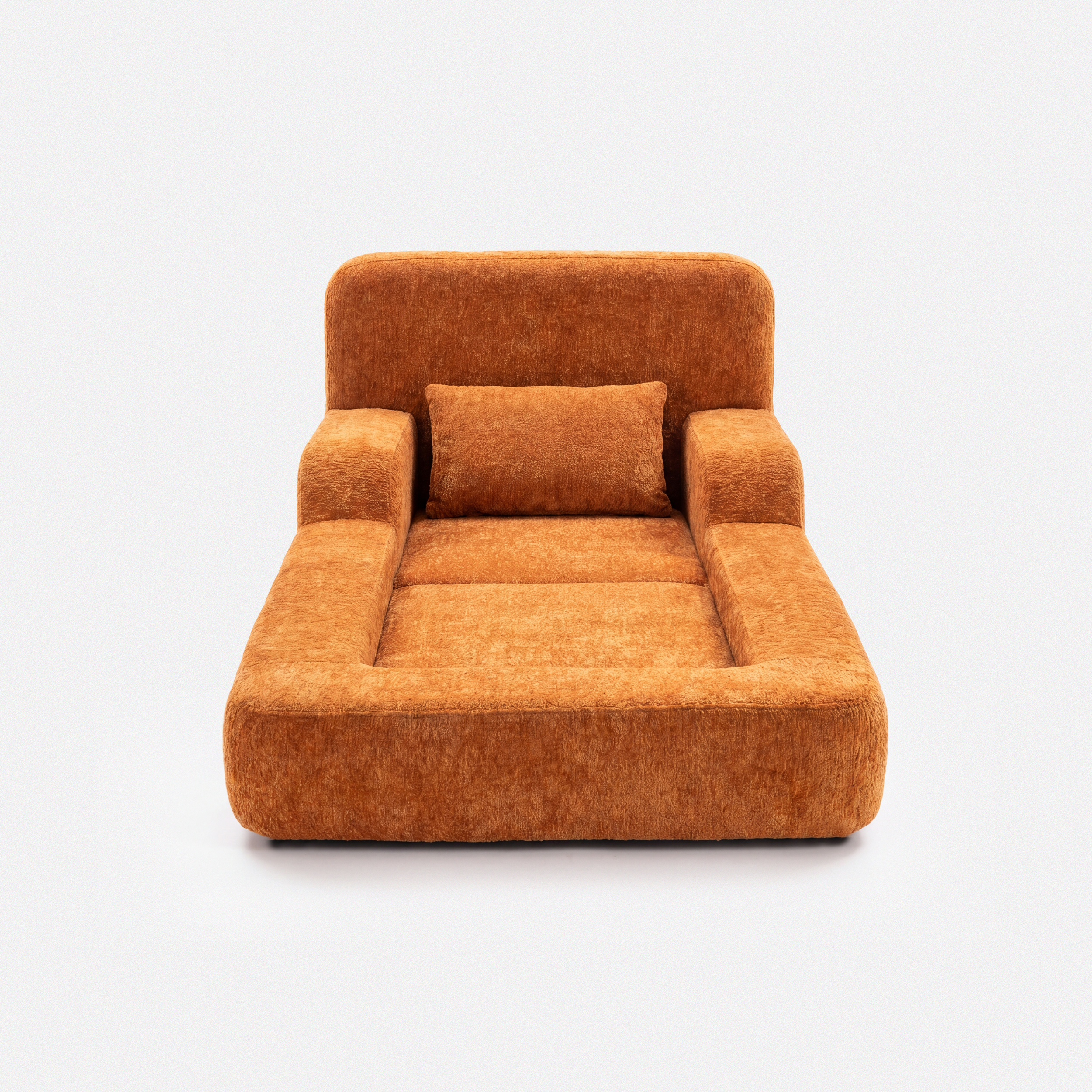 Mimi Kids Lounge Chair in Tangerine with cushioned seat, armrests, and soft pillow