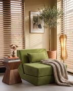 Moss Convertible Chair Bed styled in a warm cozy reading corner