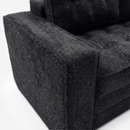 Milo Plush Sleeper Loveseat in Black with plush armrest and fabric detail