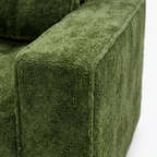 Milo Plush Sleeper Loveseat in Forest Green with plush armrest and fabric detail