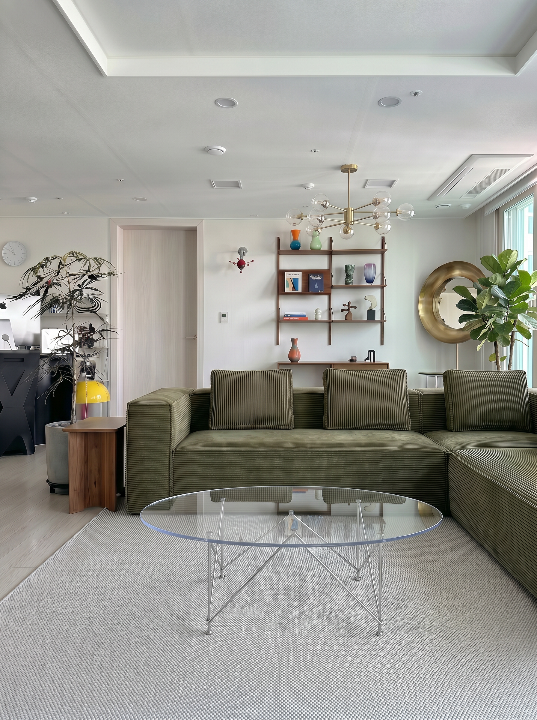 Forest green Aero deep-seat modular sectional sofa styled in a modern living room