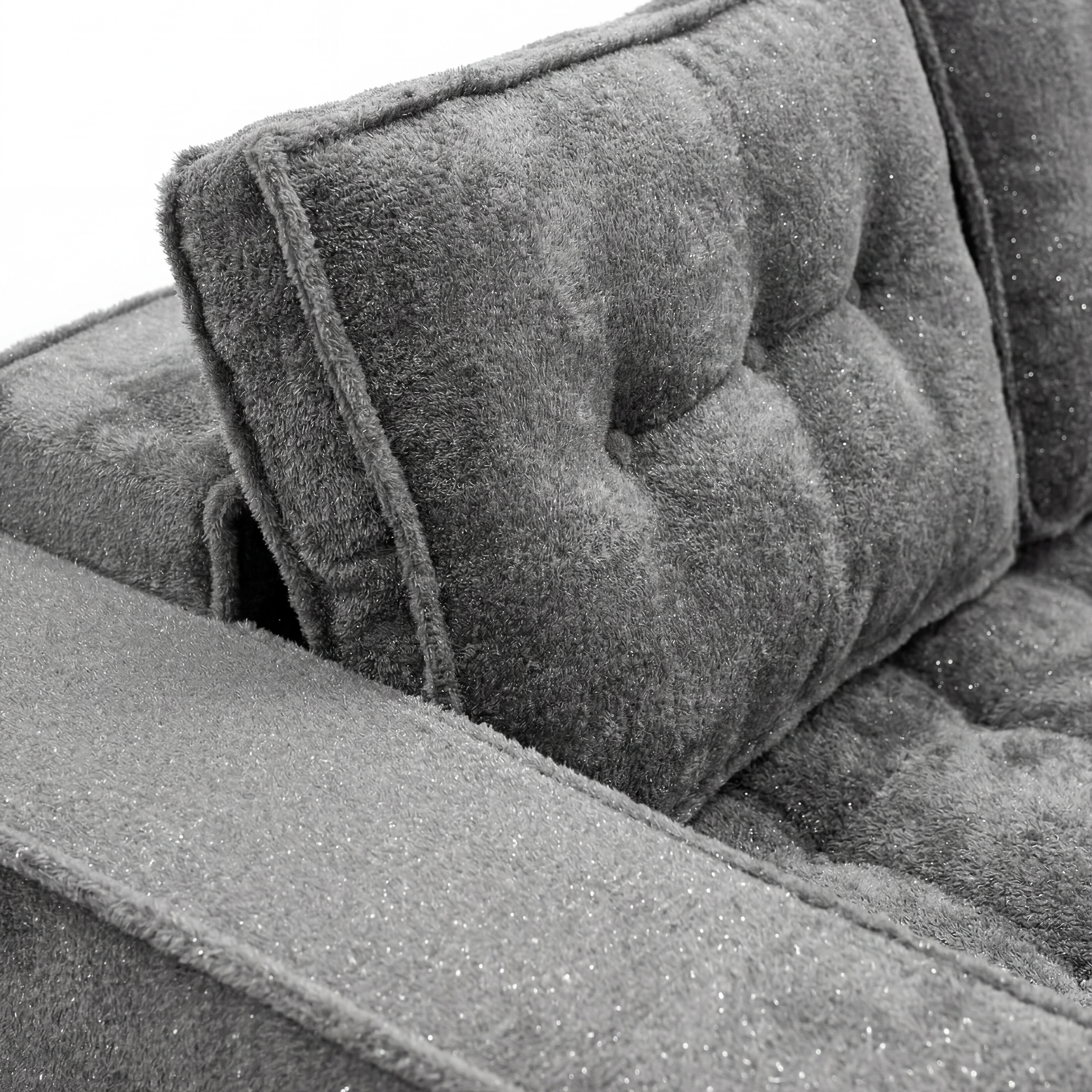 Milo Plush Sleeper Loveseat in Gray with plush armrest and tufted backrest detail