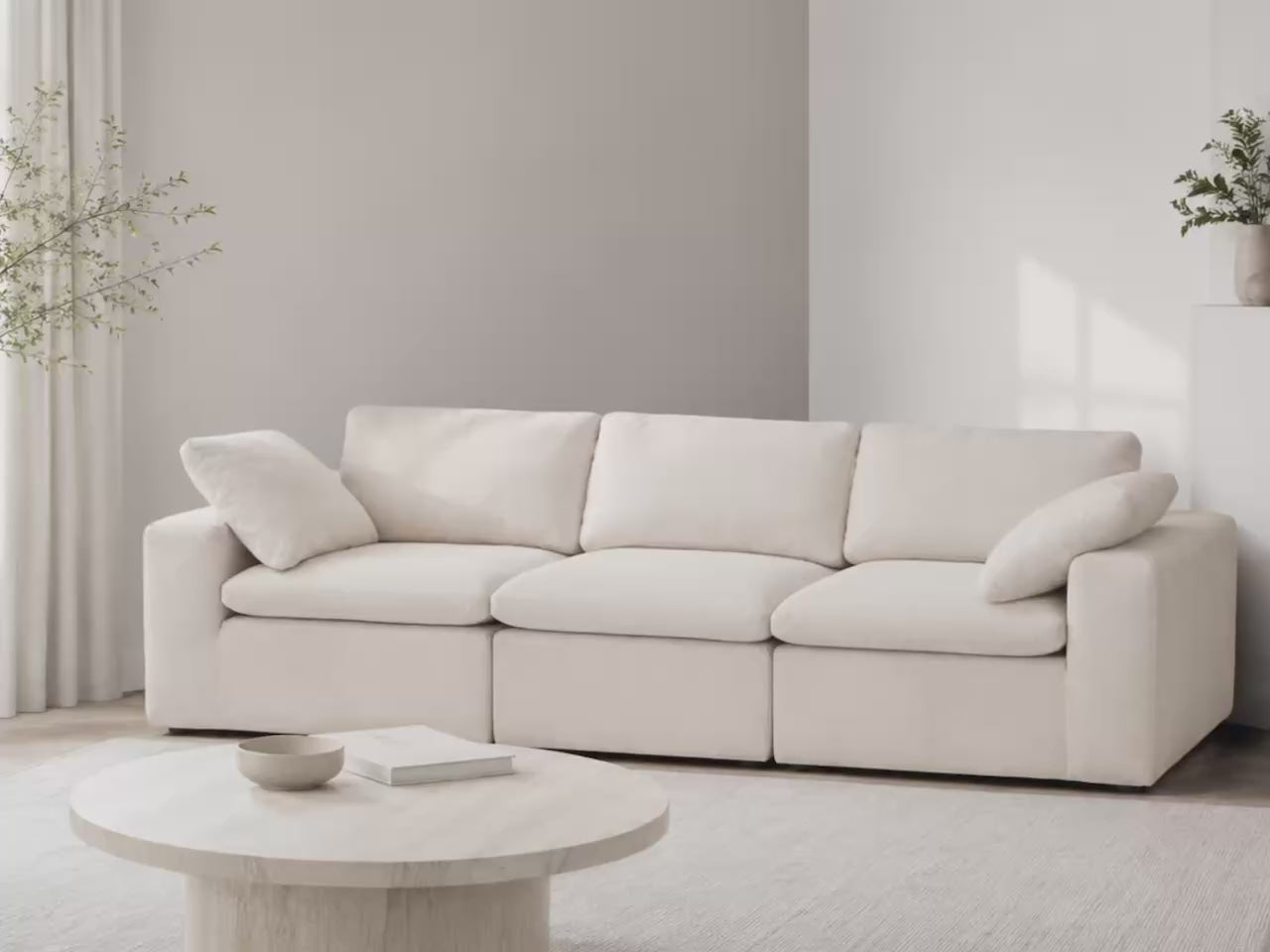 Aero wide-arm modular sectional sofa in a cream living room video