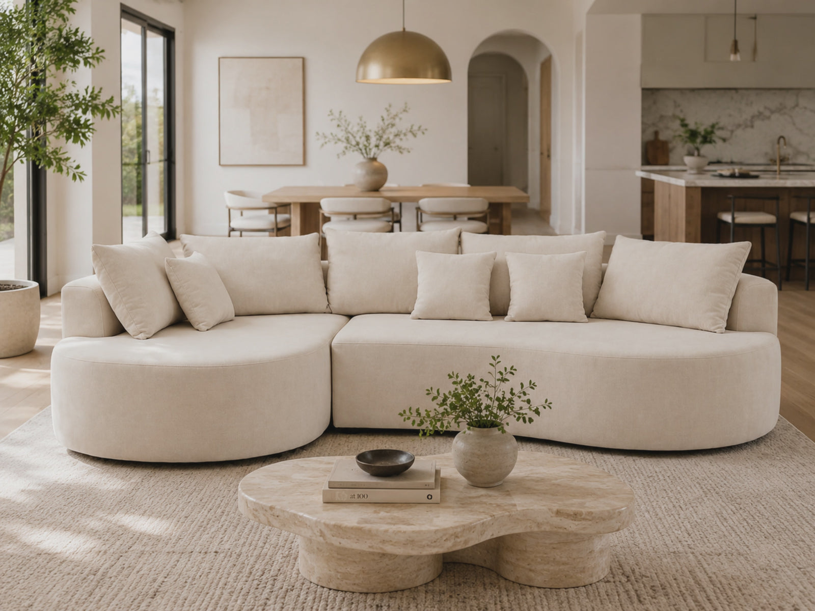 Cove Curved Sleeper Sofa video showing modular layouts for corner, open-plan, and studio living spaces